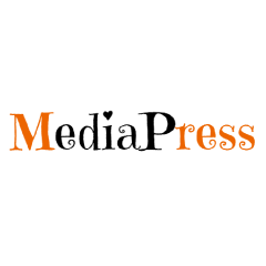 The image shows the word MediaPress with Media in orange and Press in black. The font is decorative, with playful serifs and a small heart replacing the dot above the i in Media.