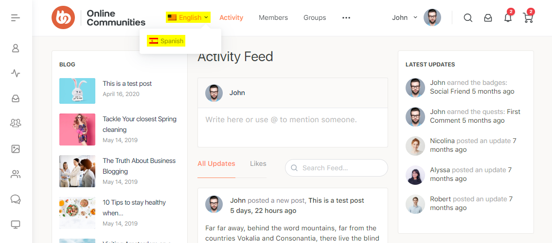 Website dashboard for Online Communities showing an activity feed recent blog posts user updates and a language dropdown with English and Spanish options User profile and notification icons are visible at the top right